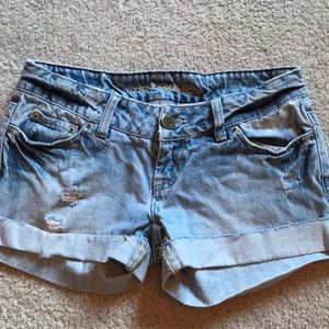 Washed-out American eagle shorts